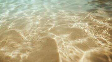 Intricate dance of sunlight reflecting on shallow sandy seabed creating mesmerizing patterns photo