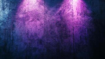 Illuminated textured wall with vibrant purple and blue gradient creating dramatic backdrop photo