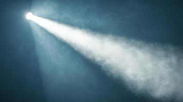 Illuminating the ether, A solitary spotlight slices through an atmosphere of ethereal mist photo