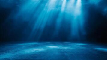 Sunlight filtering underwater casting ethereal rays on the seabed creating a serene ambiance photo