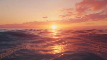 Serene seascape with gentle waves at sunset, a symphony of warm colors painting the sky photo
