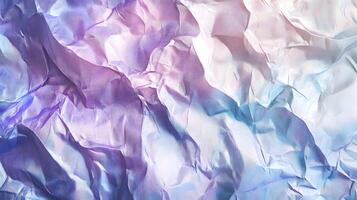 Iridescent wrinkled material showcasing textured surface and pastel color transitions photo