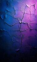 Vivid cracked wall texture gradient of blue and purple with a gritty, urban aesthetic photo