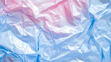 Iridescent plastic texture with pink and blue gradient color, perfect for backdrops photo