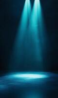 Abstract illuminated space showcasing cyan spotlights against a dark atmospheric backdrop photo