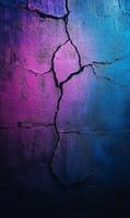 Cracked concrete texture with vibrant neon gradients illuminating abstract patterns photo