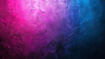 Colorful stucco wall texture with a vibrant gradient of pink and blue, artistic background photo