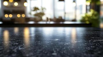Reflective black marble surface with blurred interior and light for product placement photo