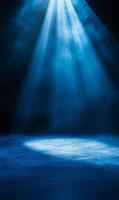 Ethereal blue spotlight illuminating mysterious stage, creating dynamic atmosphere and depth photo