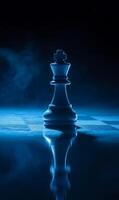 Strategic chess king piece amidst enigmatic atmosphere, blue toned composition, game reflection photo
