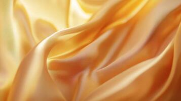 Golden fabric waves smoothly reflecting light creating soft dreamy background image photo