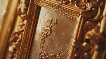 Ornate golden frame with detailed carvings enhancing the texture and depth of its surface photo