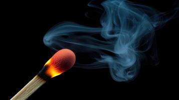 A matchstick with smoke coming out of it photo