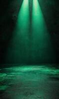 Emerald illumination backdrop with twin spotlights beaming down on a textured surface photo