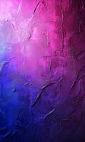 Textured ombre wall with gradient from vibrant pink to dark blue offering a visual depth photo