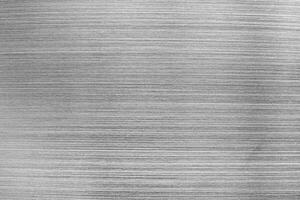 Shiny scratched metal. Abstract background. photo