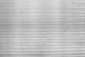 Monochrome texture of scratched metal. Abstract background. photo