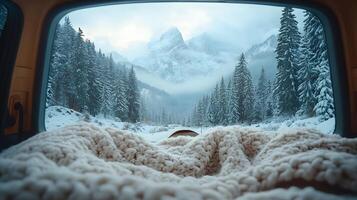 Pristine white blanket inside car frames snowy mountain vista through window, contrasting warm interior with winter pine forest and misty peak landscape. forest photo