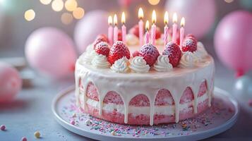Strawberry birthday cake positioned on frame's right features white dripping glaze, lit candles, and colorful sprinkles, set against soft pastel balloon background. glaze photo