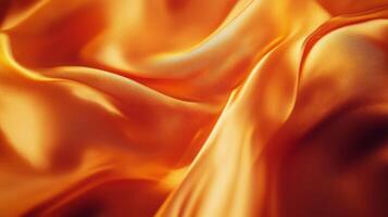 Luminous tangerine silk cascade showing mesmerizing fabric waves and glossy reflections, flow photo