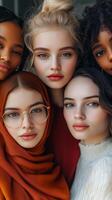 Diverse group of young women with different styles and expressions smiling together. photo