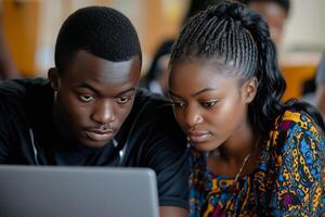 Young individuals engaged in collaborative learning at a modern workspace. photo