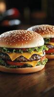 Juicy cheeseburgers served with fresh lettuce and tomatoes in a cozy restaurant setting. photo