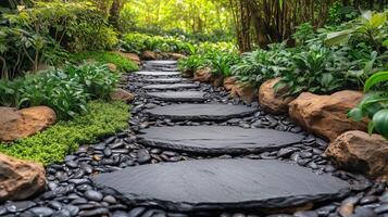 Serene garden path with stones and lush greenery during daytime. photo