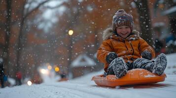 Child enjoying sledding on a snowy hill in a neighborhood during winter. photo
