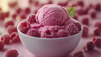 Delicious raspberry ice cream served in a white bowl surrounded by fresh raspberries. photo