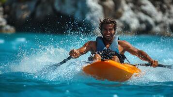 Kayaker enjoys a sunny day on clear blue water in a tropical location. photo