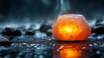 Natural salt rock illuminated by soft light in a misty water setting during twilight. photo