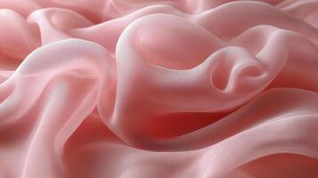 Soft pink fabric draped elegantly on a textured surface in a well-lit setting. photo