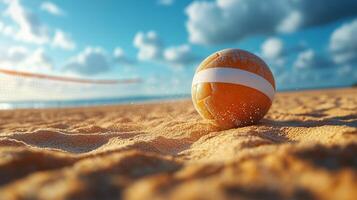 Volleyball resting on sandy beach during sunny day with clouds overhead and ocean in background. photo