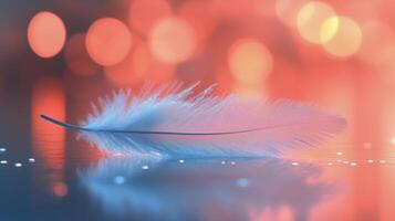 Soft blue feather resting on a reflective surface with colorful bokeh background at evening. photo
