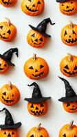 Halloween decorations featuring carved pumpkins and bats on a white background for fall festivities photo