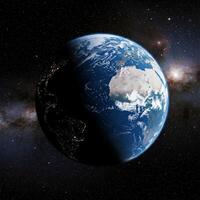 The earth is seen from space with stars in the background photo