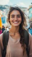A woman with a backpack smiles at the camera photo
