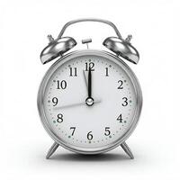 An alarm clock is shown on a white background. photo