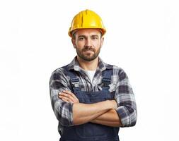 A man in overalls and a hard hat photo
