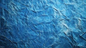 Blue crumpled paper texture background photo