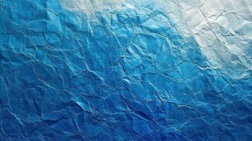 Crumpled blue paper texture background photo
