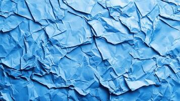Blue crumpled paper texture background design photo