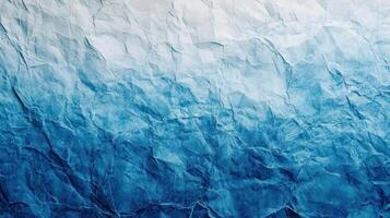 Blue crumpled paper texture background gradient photo