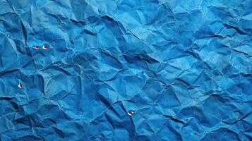 Crumpled blue paper texture background, design element photo