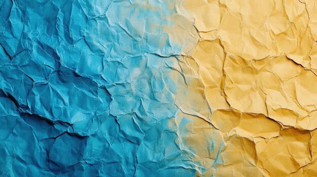 Crumpled paper background with blue and yellow colors photo