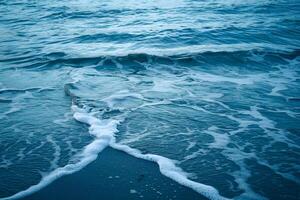 Foamy Ocean Waves Crashing on the Shore photo