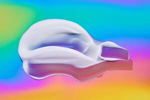 The texture of white cream on a multicolored background. photo