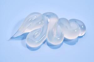 Gel toothpaste on a blue background. photo