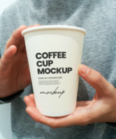 Paper cup on hand on white background front view psd
